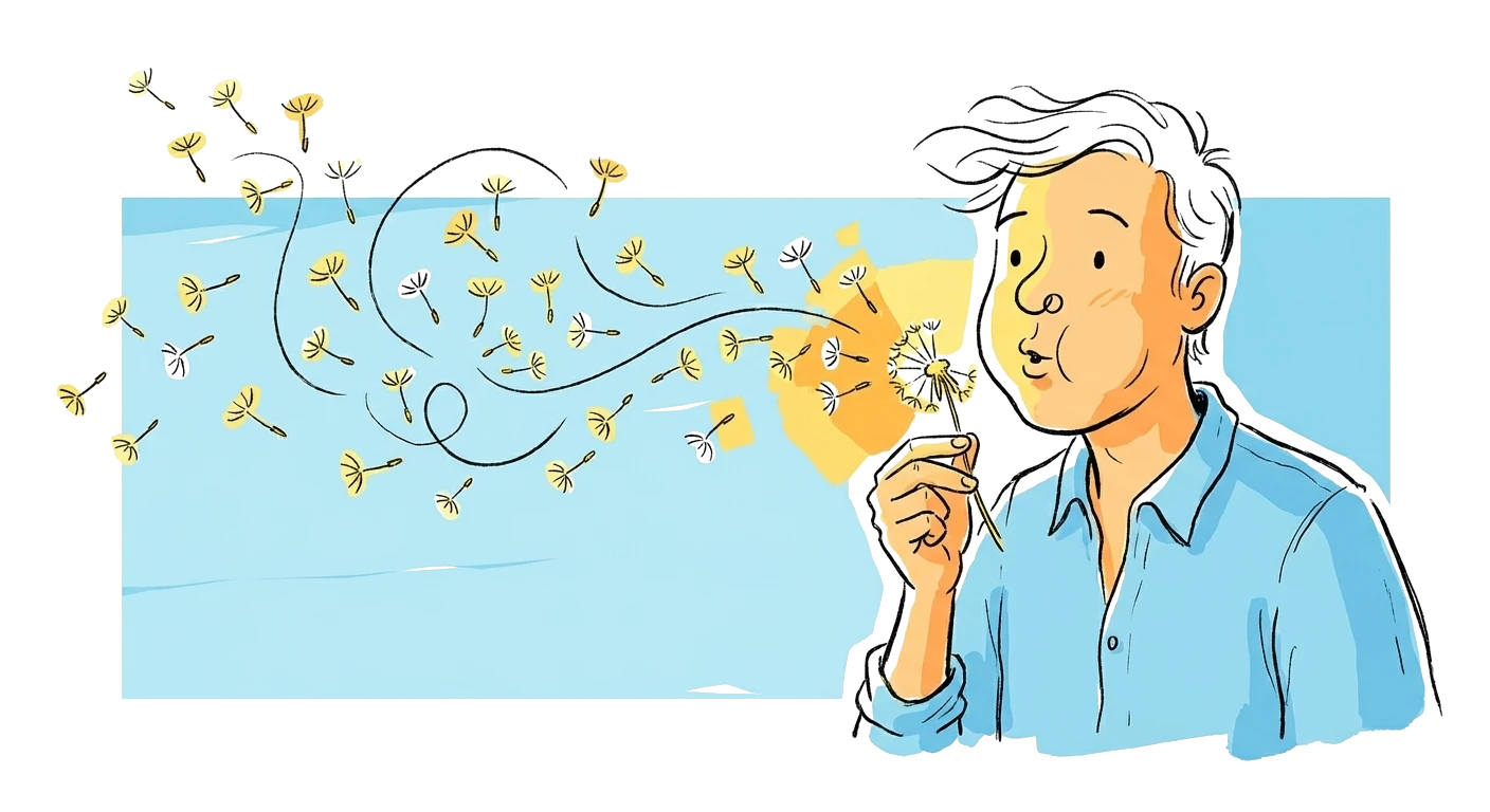 Person blowing dandelion seeds into the breeze